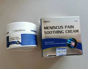 Close-up of Herbal Bone Penetrating Ointment jar and packaging